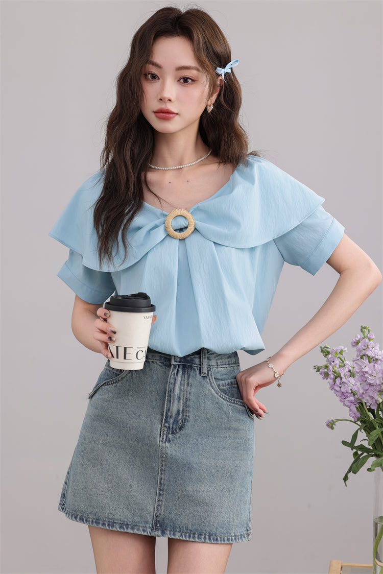 Blue Ruffled Blouse with Decorative Ring