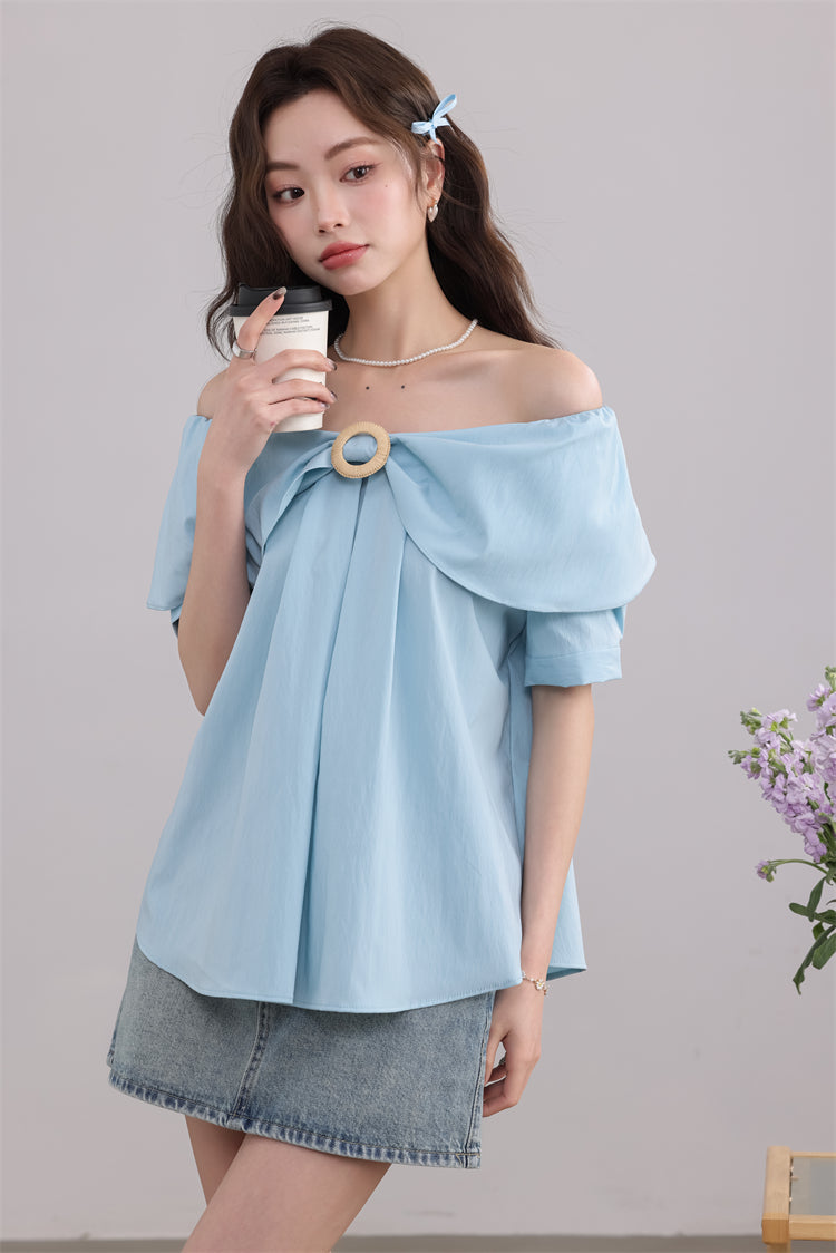 Blue Ruffled Blouse with Decorative Ring