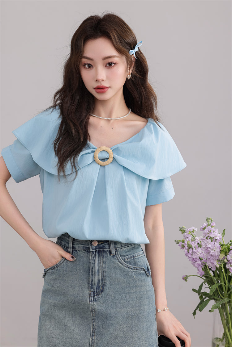 Blue Ruffled Blouse with Decorative Ring